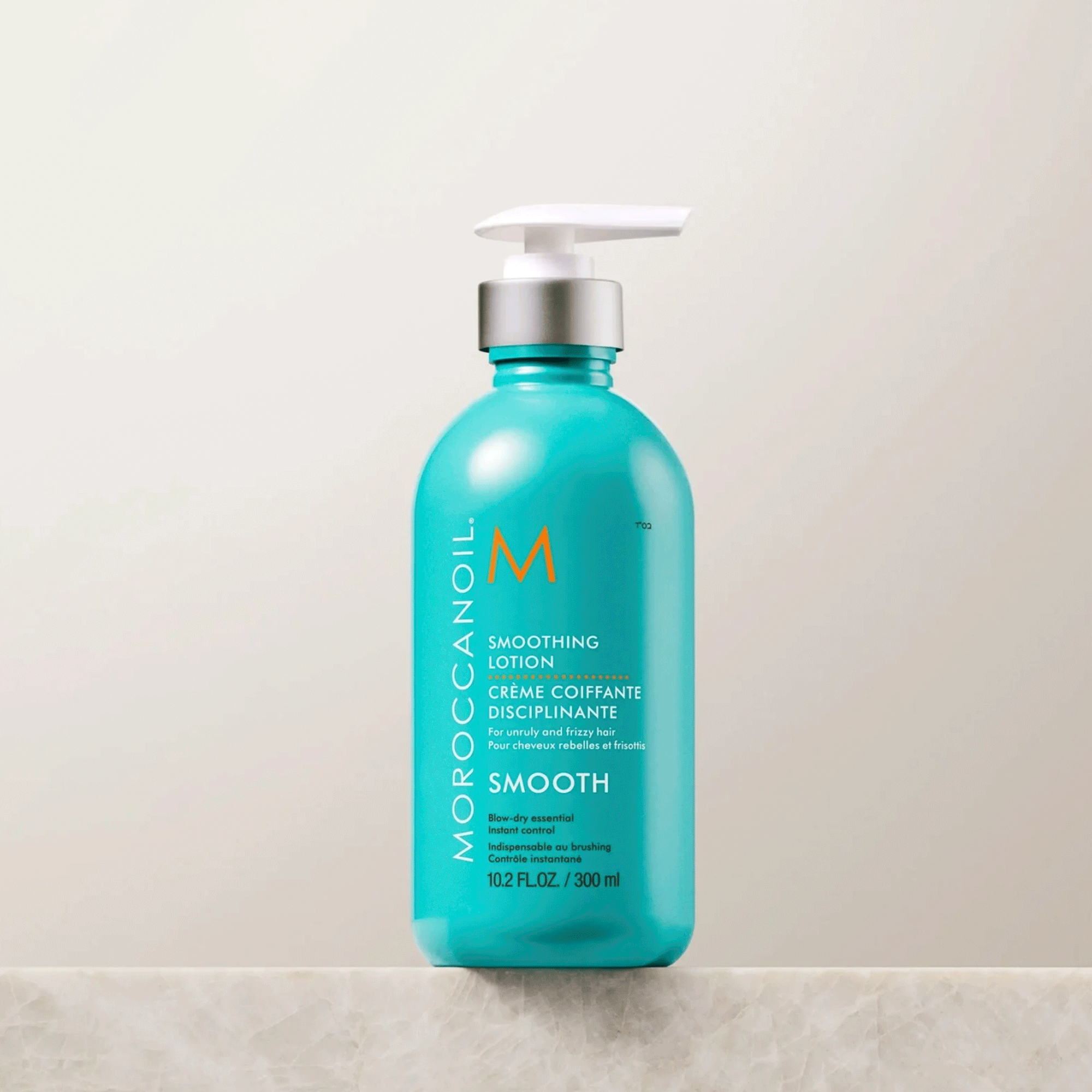 Пом'якшуючий лосьйон для волосся, що розгладжує Moroccanoil Smoothing Hair Lotion