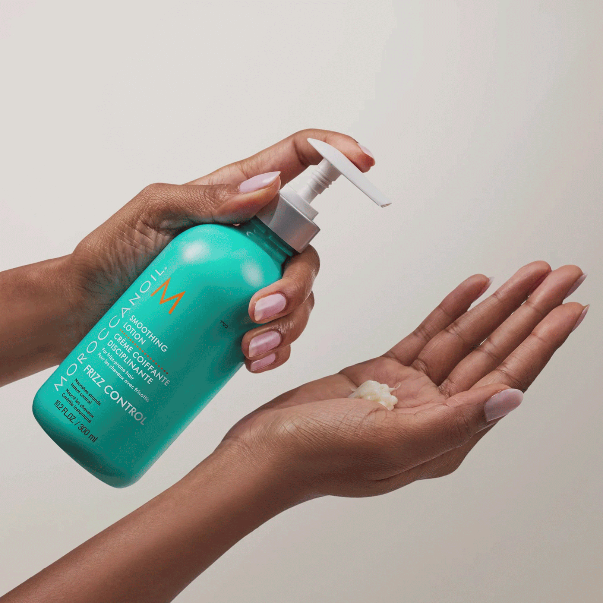 Пом'якшуючий лосьйон для волосся, що розгладжує Moroccanoil Smoothing Hair Lotion