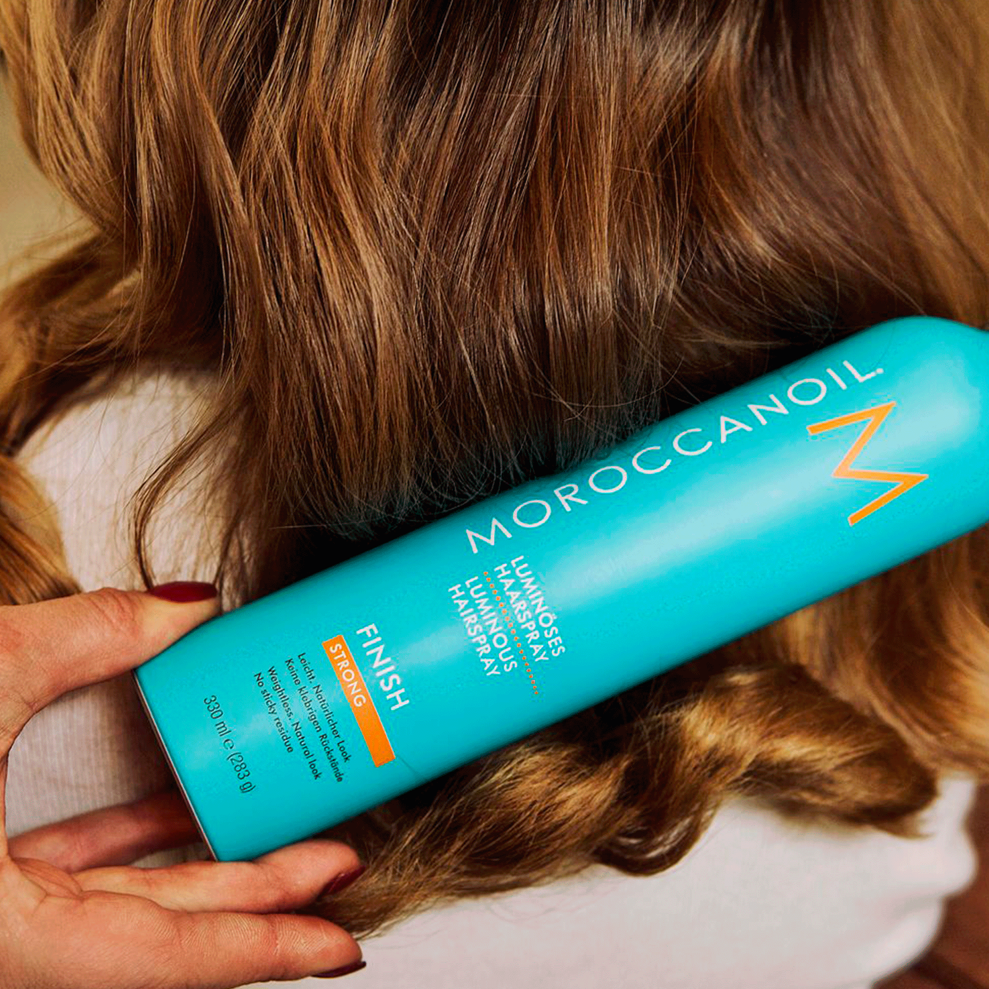 Сяючий лак для волосся сильної фіксації Moroccanoil Luminous Hairspray Strong Finish